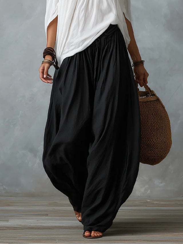 Top Bianco Off-the-shoulder e Pantaloni Lantern Larghi