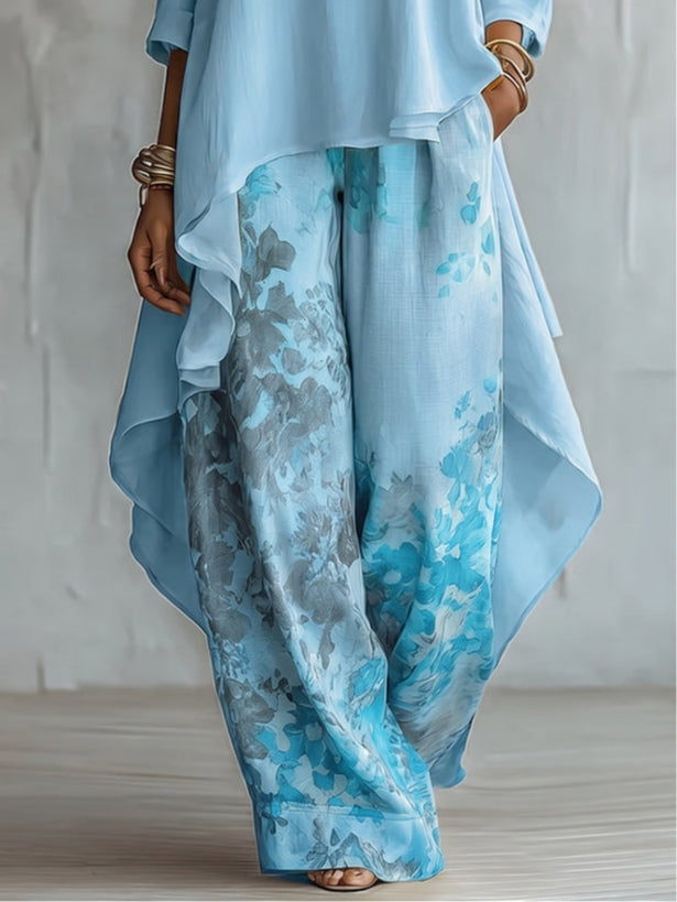 Top Asimmetrico Blu e Pantaloni Largo a Fiori