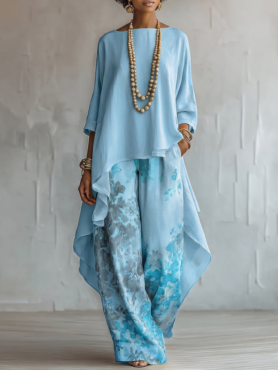 Top Asimmetrico Blu e Pantaloni Largo a Fiori