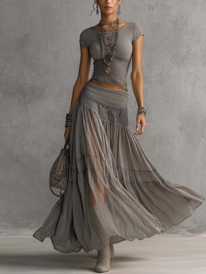 Top Grigio in Pizzo Trasparente e Set di Gonna Maxi Plissettata