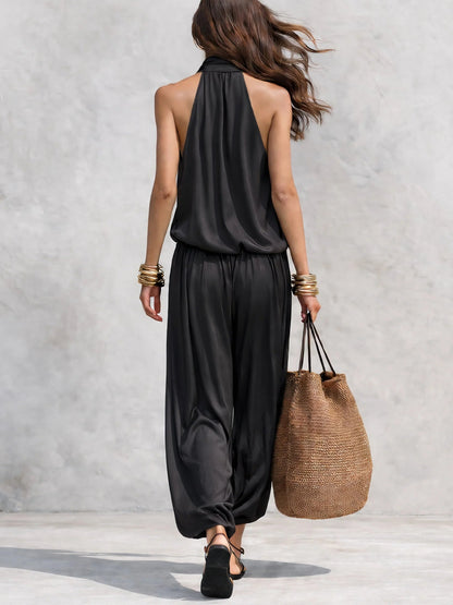 Set Top Senza Maniche con Collo Halter Nero e Pantaloni Plissettati