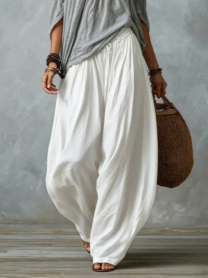 Top Grigio Off-shoulder e Pantaloni Lantern Bianchi Svasati