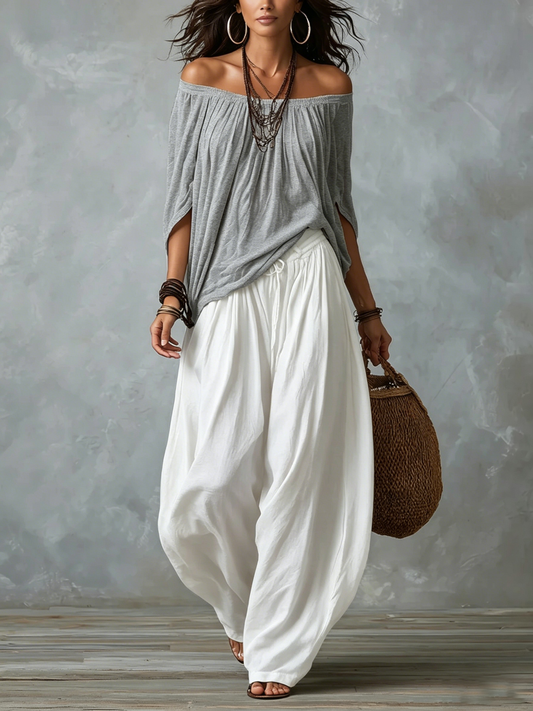 Top Grigio Off-shoulder e Pantaloni Lantern Bianchi Svasati