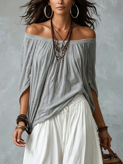 Top Grigio Off-shoulder e Pantaloni Lantern Bianchi Svasati