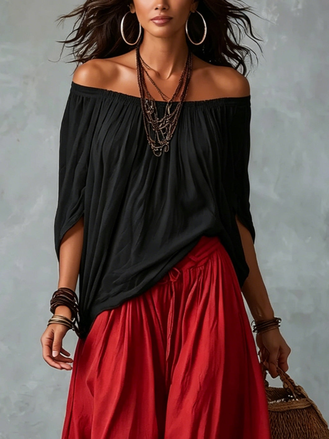 Top Nero Off-Shoulder e Pantaloni Lantern Rossi a Vestibilità Larga