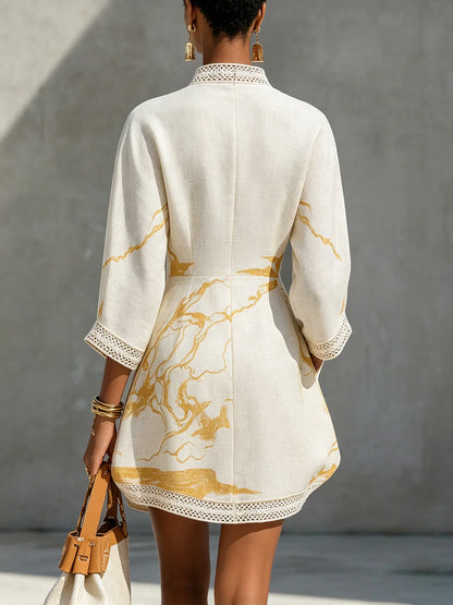 Minidress con scollatura a V e pizzo all'uncinetto