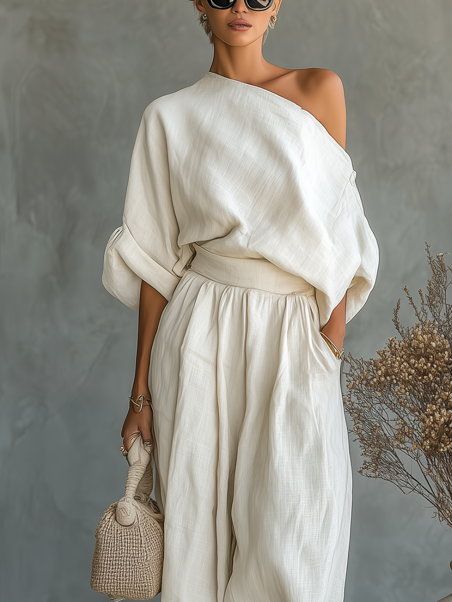 Set in lino bianco sporco da donna con top off-shoulder e pantaloni tapered • S1